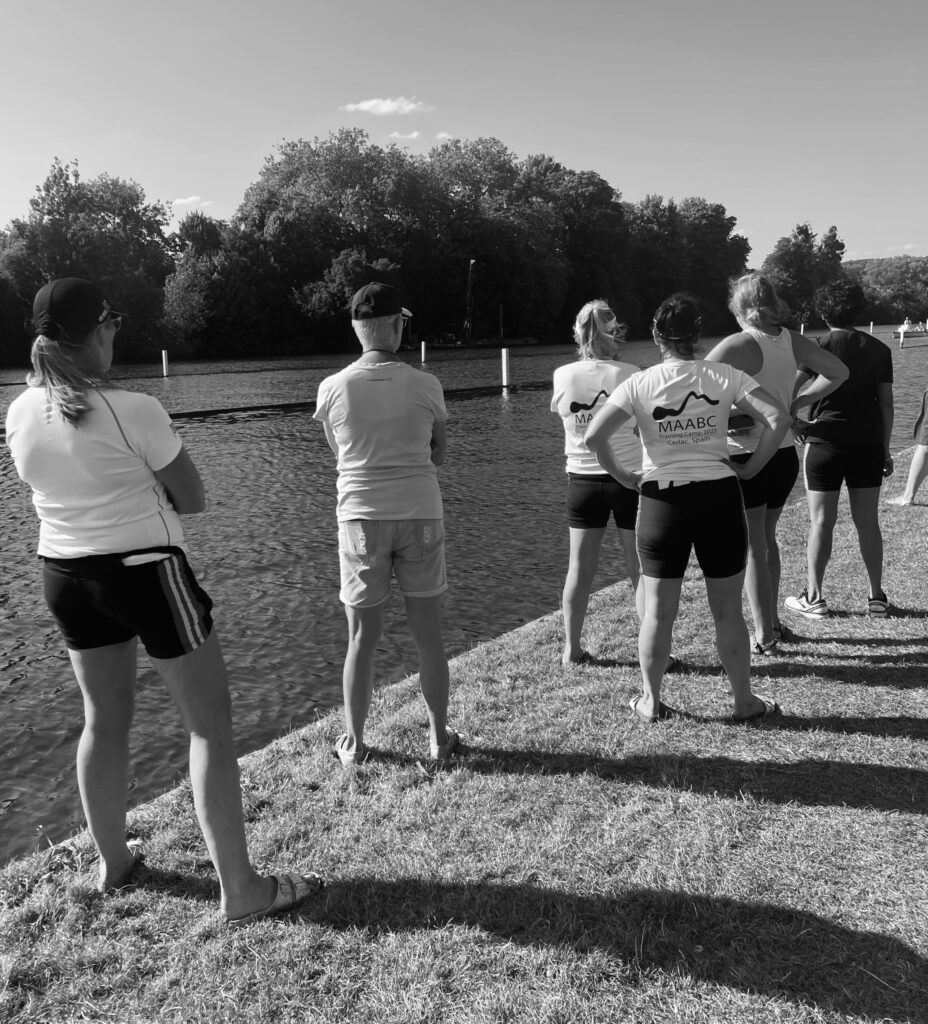 Group of MAA supporters watching a race from the bank