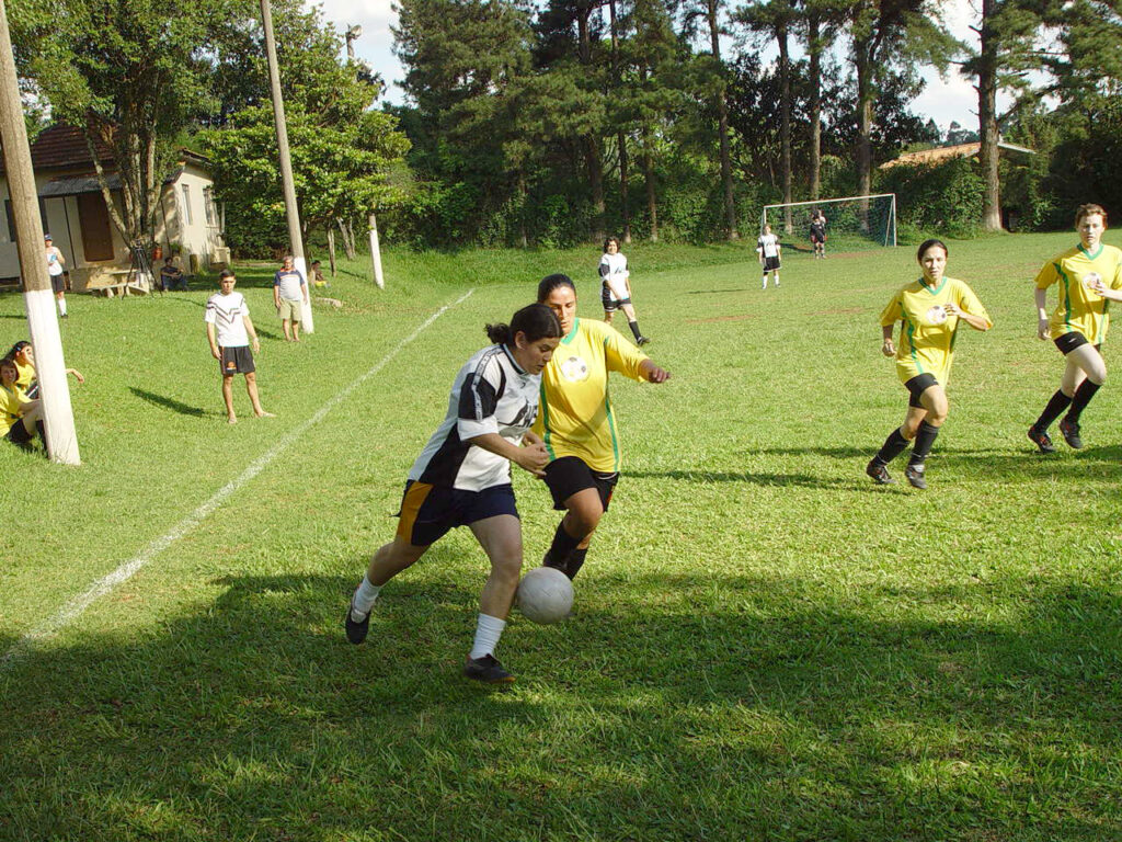 A team of women playing football to keep fit, win and to have fun